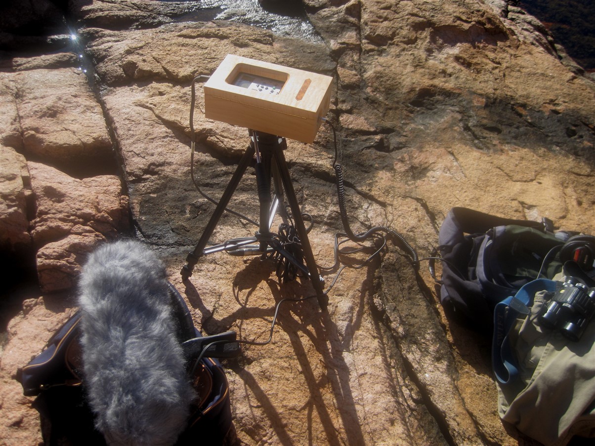 Recording gear spread out on coastal rocks